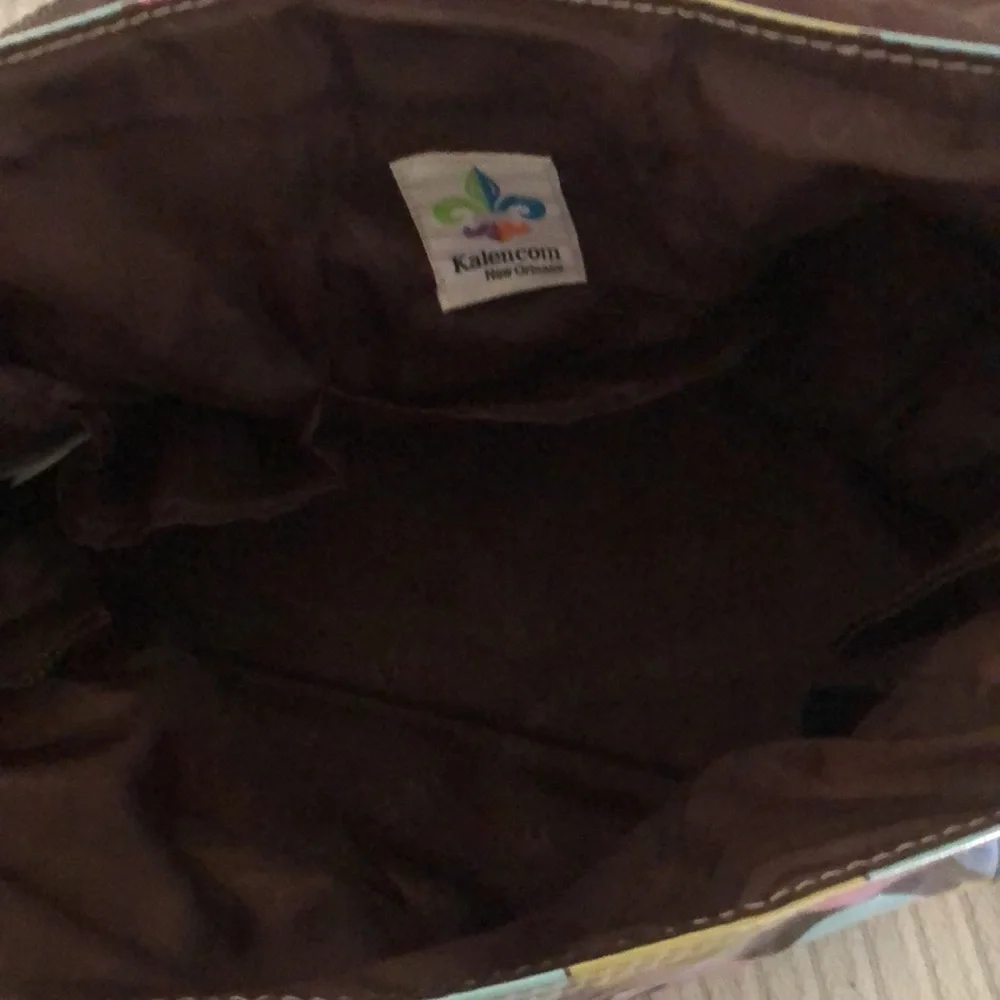 Multi colored easy wipe pokadot kalencom diaper bag